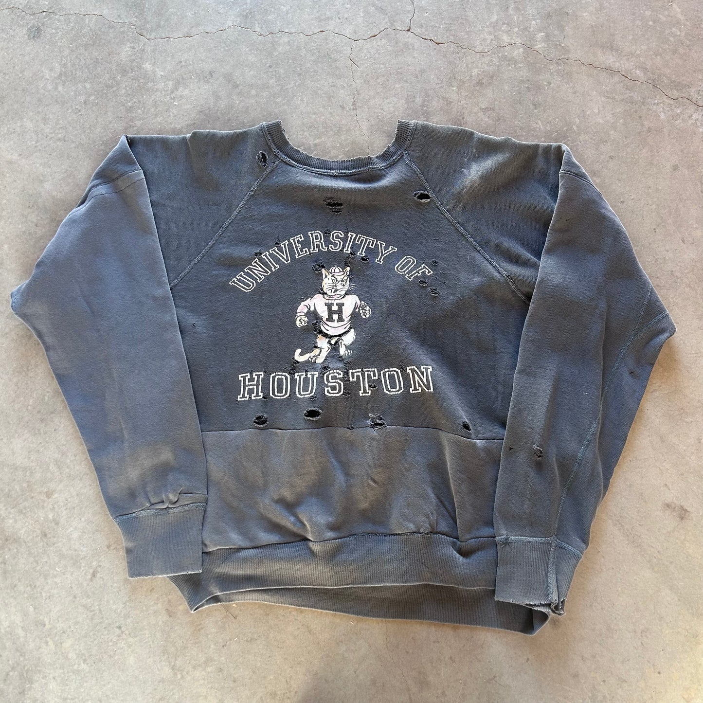 1960S U OF H REPAIRED SWEATSHIRT