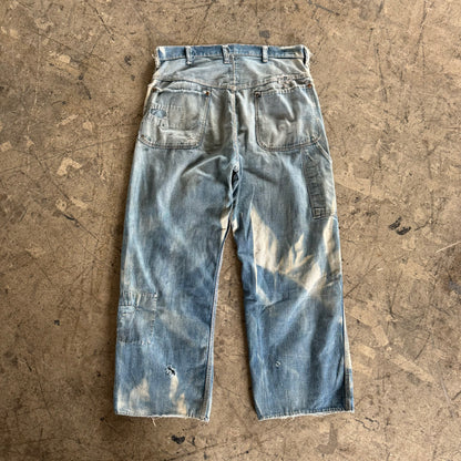 1940S FADED REPAIRED DONUT BUTTON JEANS